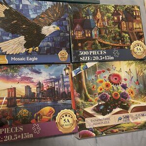Jigsaw Puzzle Set of 4 /500 piece puzzles with letters on the back.